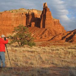 This is a photo of Steve Greenwood photographing Chimney Rock at Capitol Reef National Park, Utah.