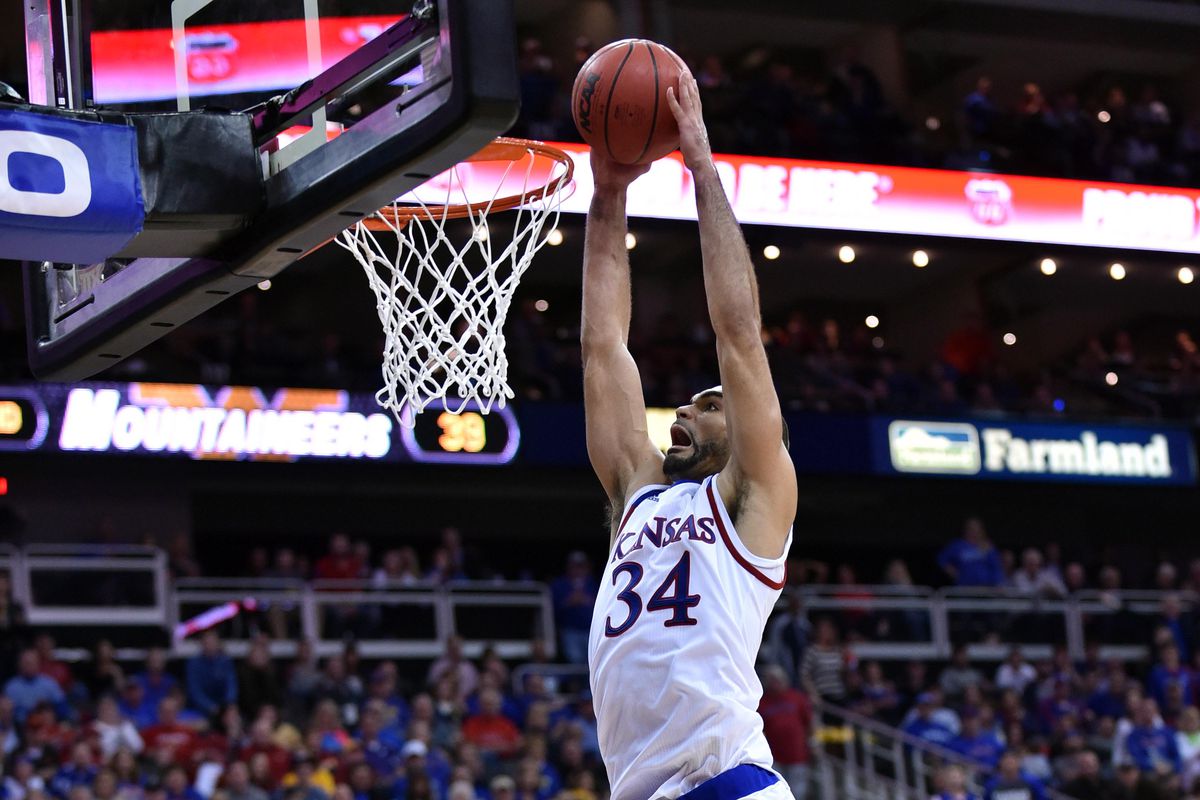 9th year senior Perry Ellis skies for a dunk in the Big 12 Championship Game.