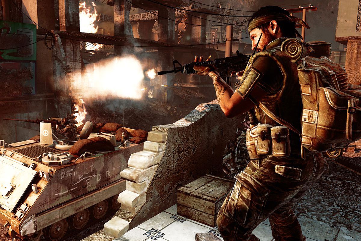 Call of Duty: Black Ops - soldier firing as tank gunner fires in the background