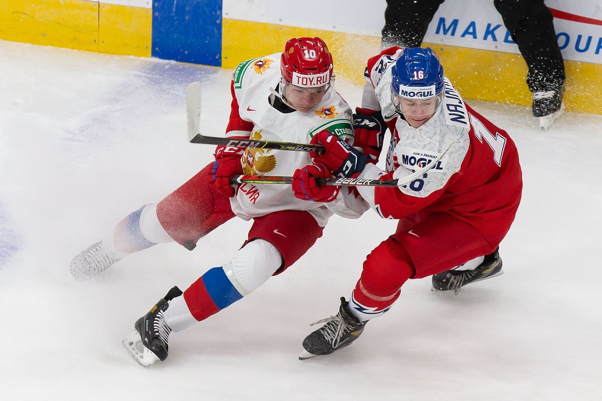 Vladislav Firstov #10 of Russia skates against Adam Najman #16 of the Czech Republic during the 2021 IIHF World Junior Championship at Rogers Place on December 27, 2020 in Edmonton, Canada.