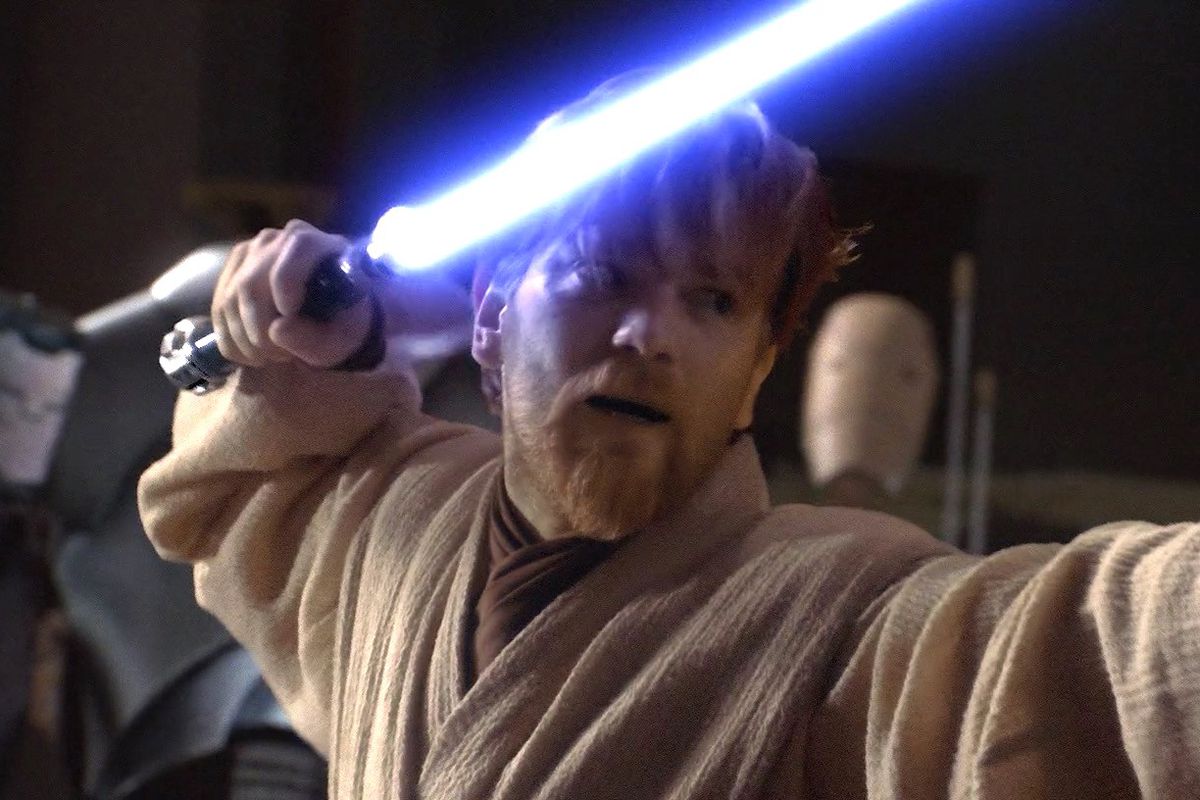 Obi-Wan Kenobi (Ewan McGregor) stands in a fighting position with his lightsaber in the air as he prepares to battle General Grevious in Revenge of the Sith.