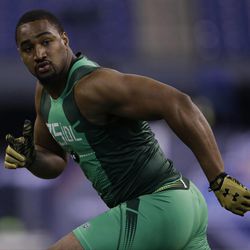 Utah defensive lineman Nate Orchard runs a drill at the NFL football scouting combine in Indianapolis, Sunday, Feb. 22, 2015. 