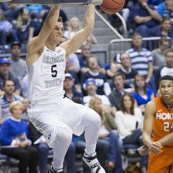 BYU's Kyle Collinsworth slams home two points against Virginia Tech on Friday, March 18, 2016, at the Marriott Center in their NIT second-round matchup. The Cougars won, 80-77.
