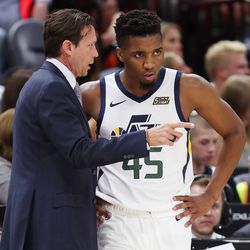 Utah Jazz head coach Quin Snyder talks with Utah Jazz guard Donovan Mitchell as the Utah Jazz and the Perth Wildcats play in an exhibition basketball game at Vivint Arena in Salt Lake City on Saturday, Sept. 29, 2018.