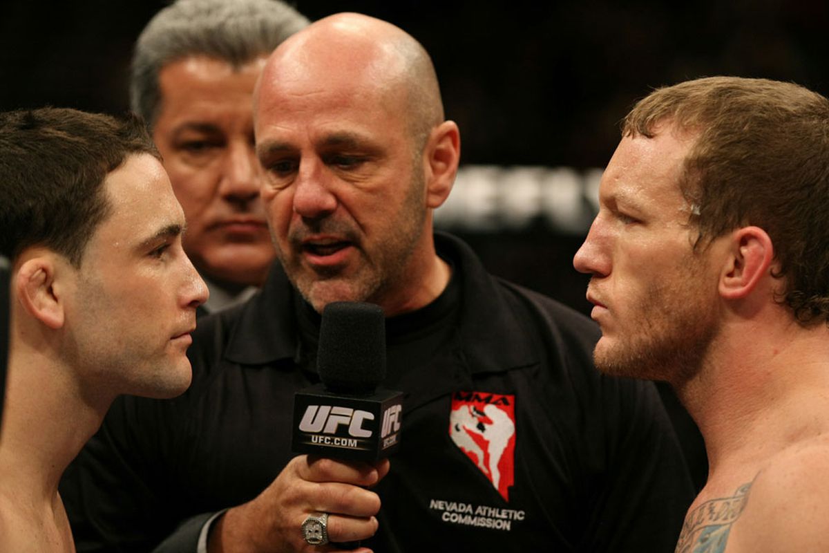 Yves Lavigne gives his final instructions to Frankie Edgar and Gray Maynard before their fight of the year contender at UFC 125. <em>Photos by Josh Hedges/Zuffa LLC/Zuffa LLC via Getty Images</em>