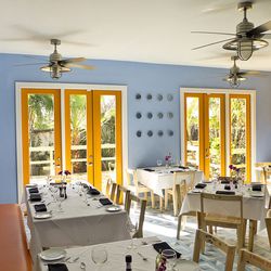 La Fisheria's dining room captures the coastal, beach atmosphere that matches chef Aquiles Chavez's coastal cuisine. If a person wants a coastal escape but can't make it to Galveston, La Fisheria fits the bill. Photo Credit: Gary Wise