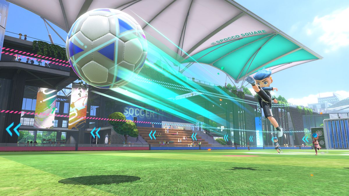 A blue haired gamer is kicking a giant soccer ball in this screenshot from Nintendo Switch Sports.