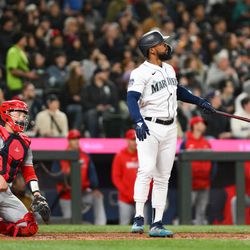 Seattle Mariners right fielder Teoscar Hernandez (35) hits a 3-run home run against the Los Angeles Angels during the fifth inning at T-Mobile Park