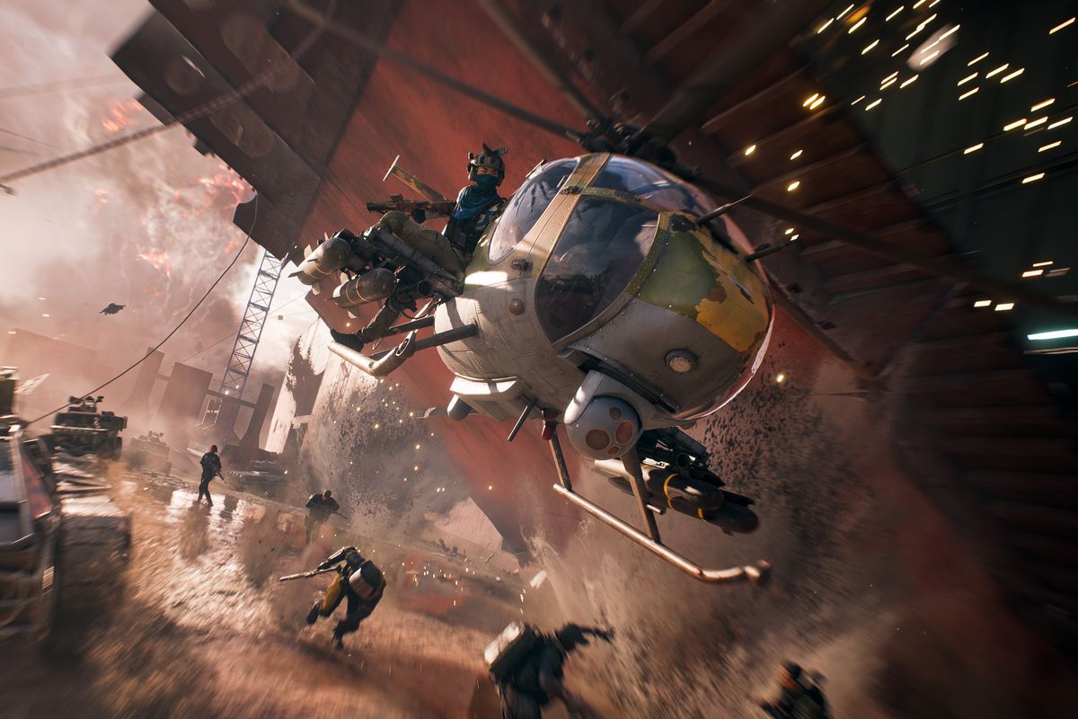 Cars and helicopters wage war in a screenshot from Battlefield 2042