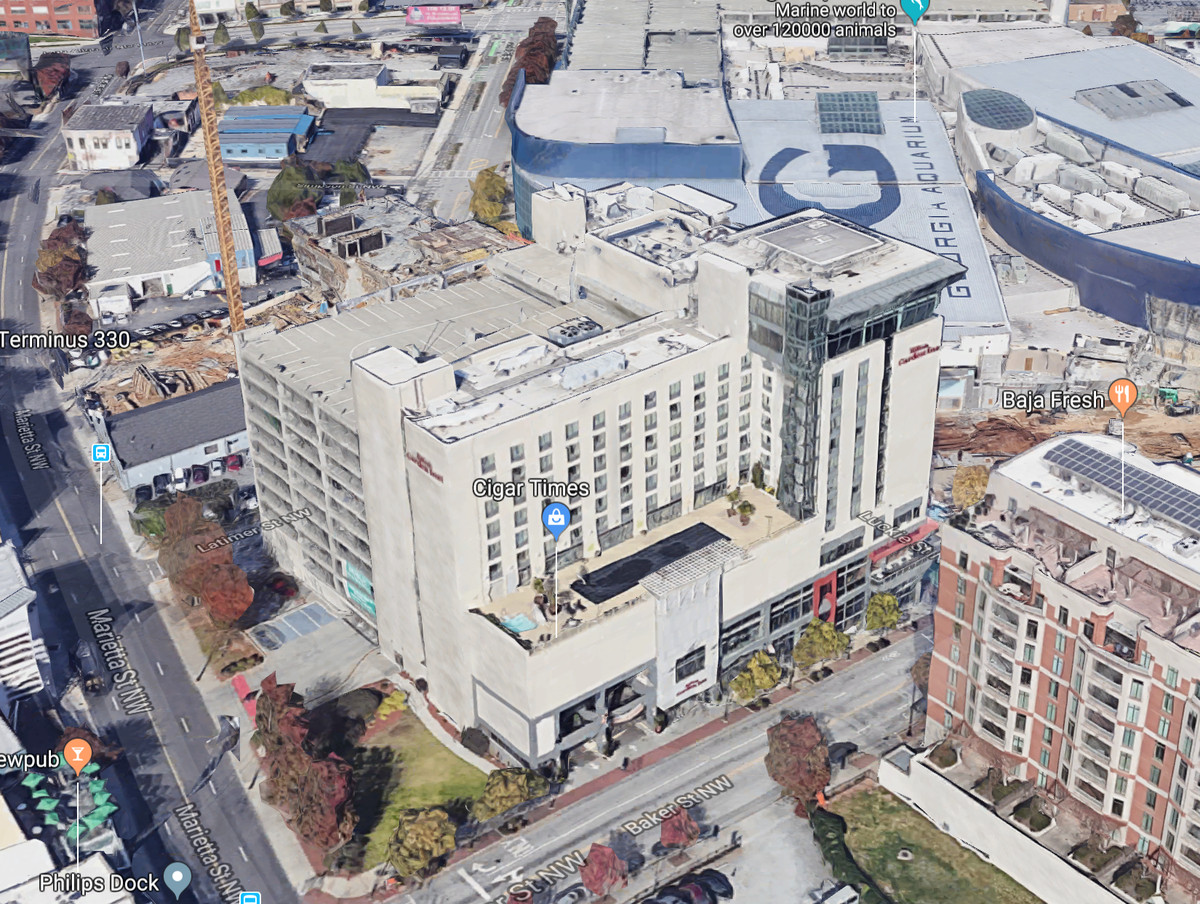 An overhead image of the existing parking deck and hotel.