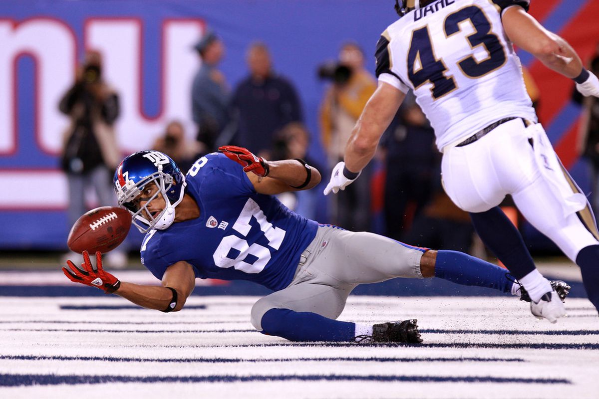 Domenik Hixon made this brilliant touchdown catch to help the New York Giants beat the St. Louis Rams in Week 2. He also wrecked his knee making the catch, thus ending his season.  (Photo by Nick Laham/Getty Images)