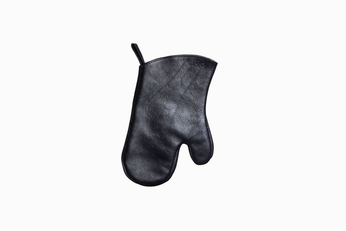 A black leather oven mitt