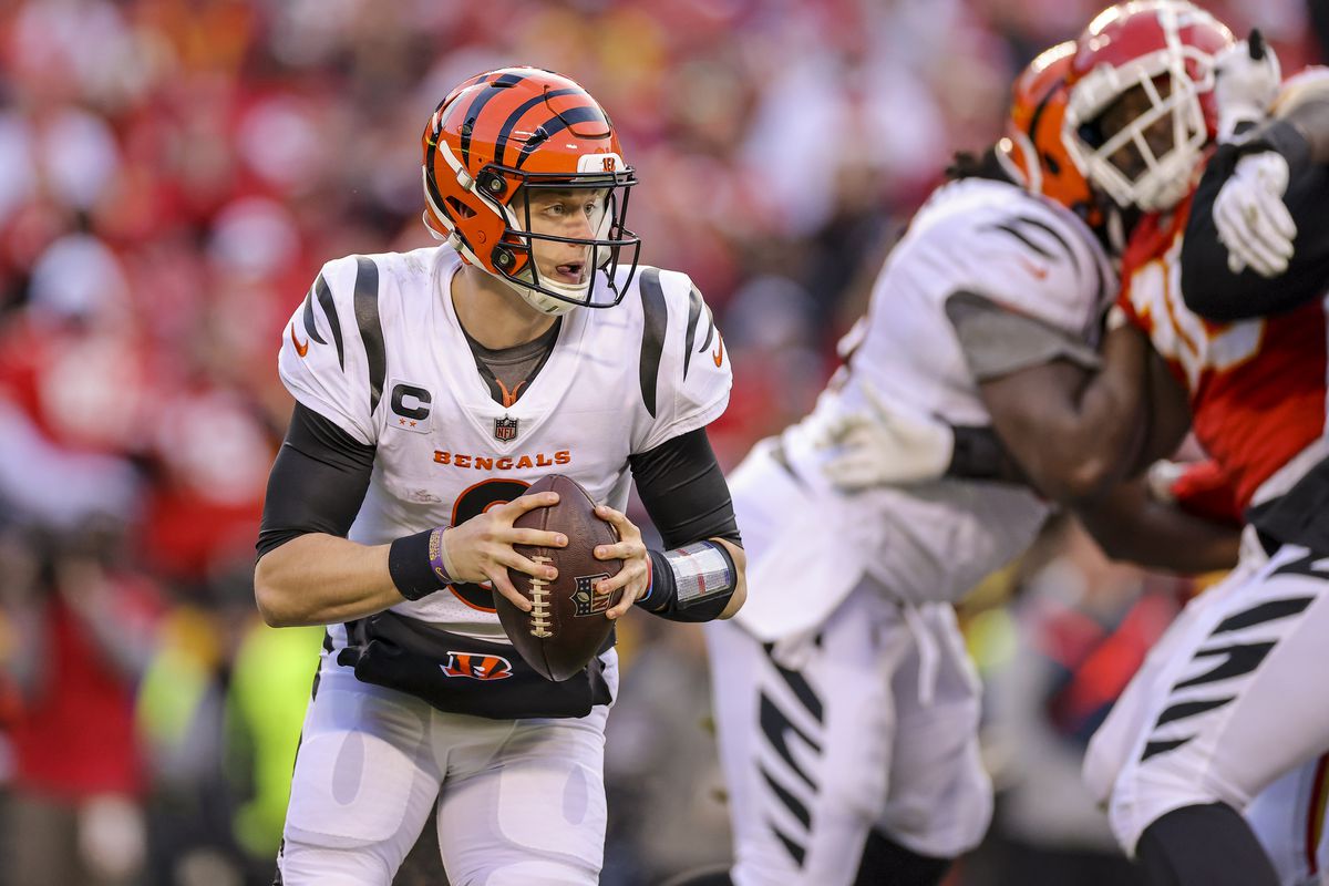 Joe Burrow #9 of the Cincinnati Bengals runs with the football during the fourth quarter of the AFC Championship Game against the Kansas City Chiefs at Arrowhead Stadium on January 30, 2022 in Kansas City, Missouri, United States.