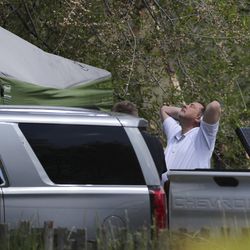 Logan Police Lt. Rod Peterson holds his head in his hands while working at the scene where police found a body they believe to be Elizabeth Shelley, 5, in Logan on Wednesday, May 29, 2019. She was last seen about 2 a.m. Saturday, May 25, 2019.