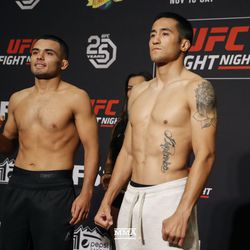 Mark de la Rosa and Joby Sanchez pose at UFC Denver weigh-ins.