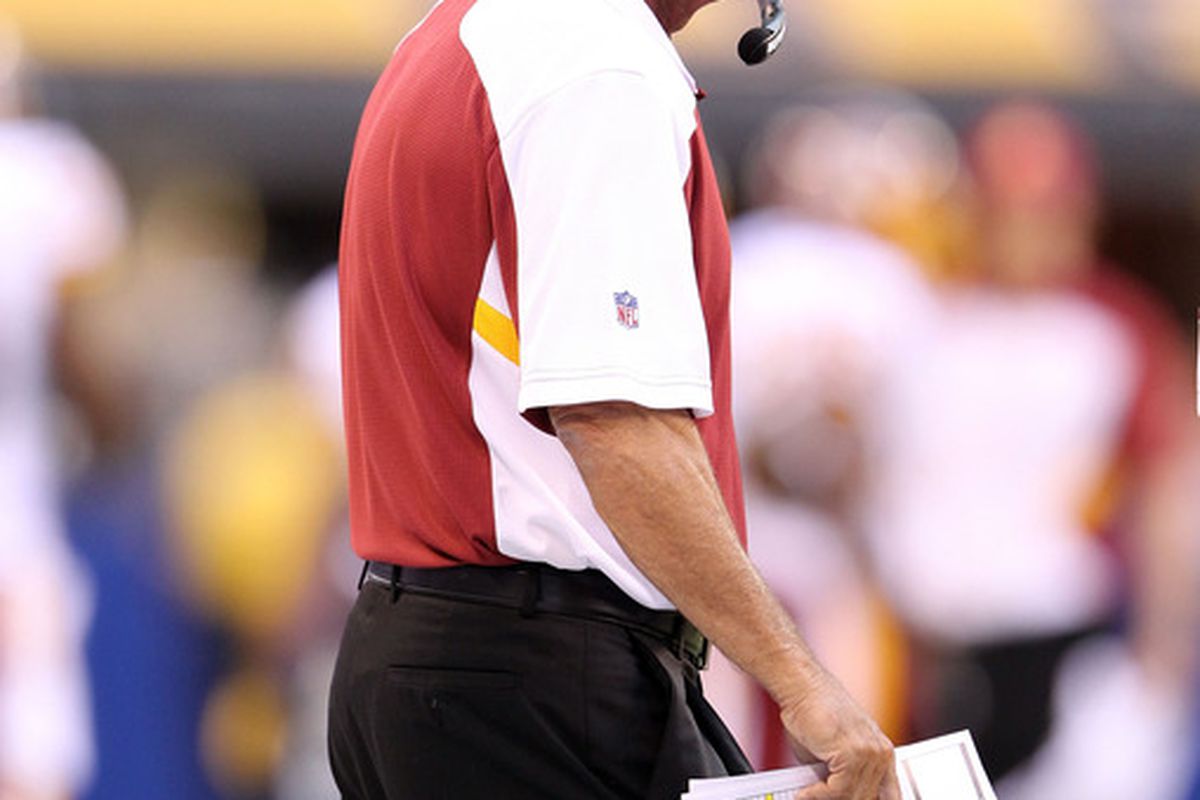 INDIANAPOLIS, IN - AUGUST 19: Mike Shanahan the Head Coach of the Washington Redskins watches the action during the game against Indianapolis Colts at Lucas Oil Stadium on August 19, 2011 in Indianapolis, Indiana.  (Photo by Andy Lyons/Getty Images)