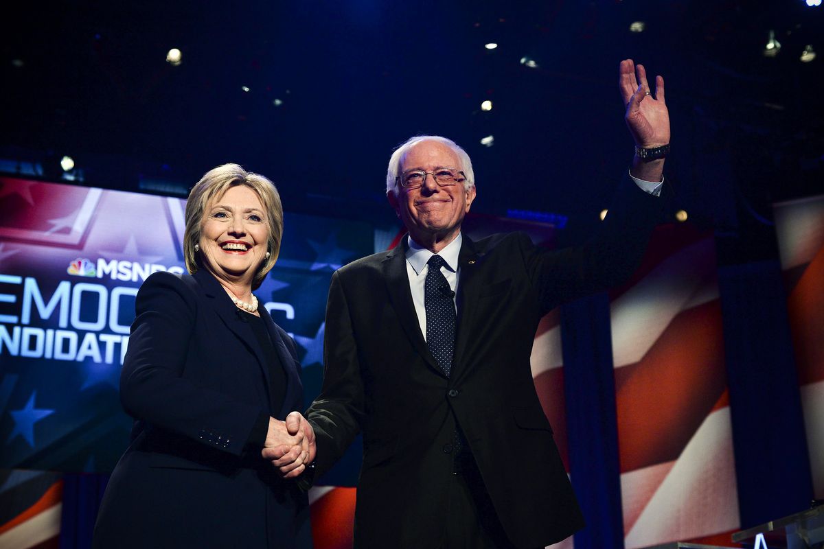 Democratic presidential candidates Hillary Clinton and Bernie Sanders shake hands before participating in the MSNBC Democratic Candidates Debate at the University of New Hampshire, on February 4, 2016. Sanders would go on to win the state’s primary.