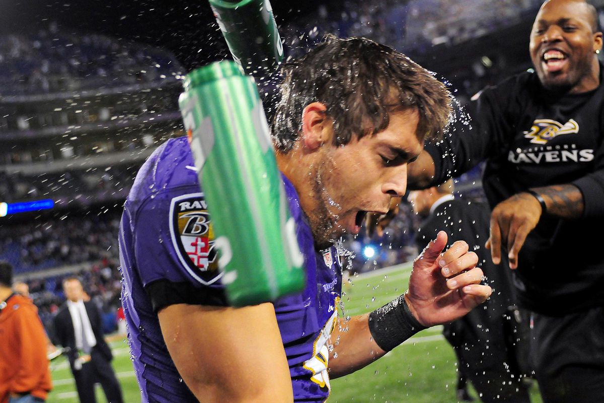 Terrell Suggs soaked Justin Tucker in water after Tucker made a game-winning field goal against New England last season.