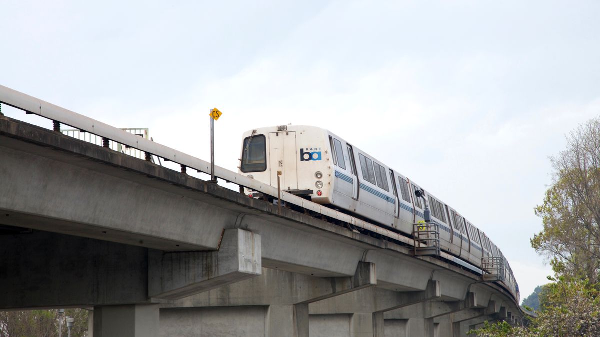 A BART train running on an elevated track.