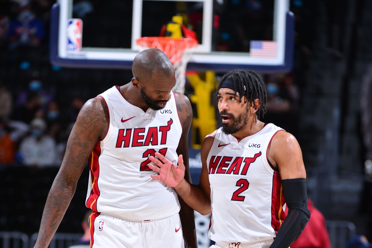 Dewayne Dedmon #21 and Gabe Vincent #2 of the Miami Heat share a conversation during the game Denver Nuggets on April 14, 2021 at the Ball Arena in Denver, Colorado