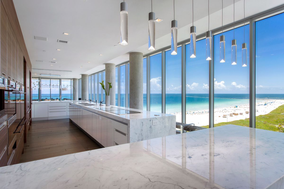 a high-end open kitchen inside the penthouse at 321 ocean overlooking South Beach
