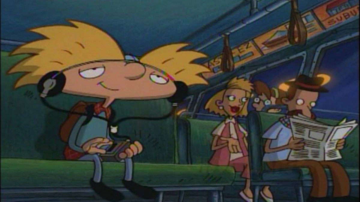 Arnold sitting on a bus in a Hey Arnold! episode.