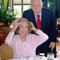In this April 25, 1997 file photo, Helen Gurley-Brown, editor-in-cheif of the Cosmopolitan International Editions, prepares for a photo session with her husband Hollywood film producer David Brownat a hotel in suburban Makati City.