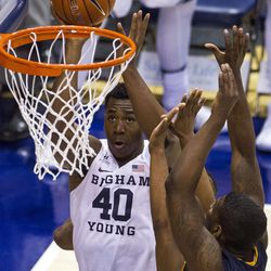 Brigham Young forward Jamal Aytes (40) attempts a shot during an NCAA college basketball game against Coppin State in Provo on Thursday, Nov. 17, 2016.