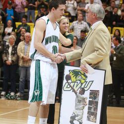 UVU A.D. Mike Jacobsen with former Wolverine guard and career scoring leader Ryan Toolson at Toolson's final home game.
