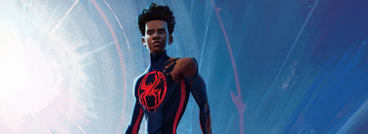 Miles Morales in his dark-hued Spider-Man costume, stands unmasked, the shoulder of his costume torn off, looking down as a huge lens flare lights up the sky behind him in Across the Spider-Verse 