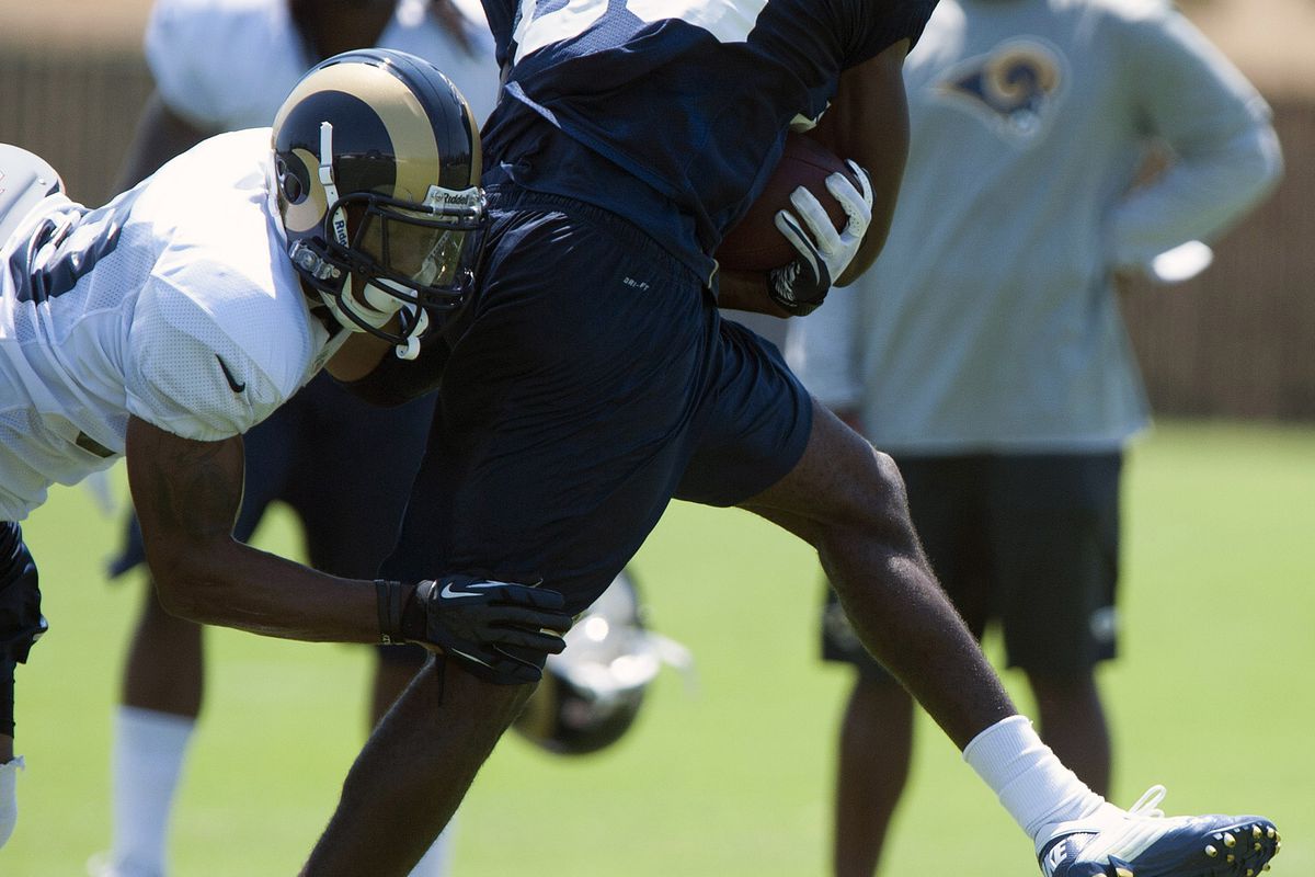 July 27, 2012; St. Louis, MO, USA; St. Louis Rams wide receiver Brian Quick (83) carries the ball as safety Rodney McLeod (38) defends during training camp at ContinuityX Training Center. Mandatory Credit: Jeff Curry-US PRESSWIRE