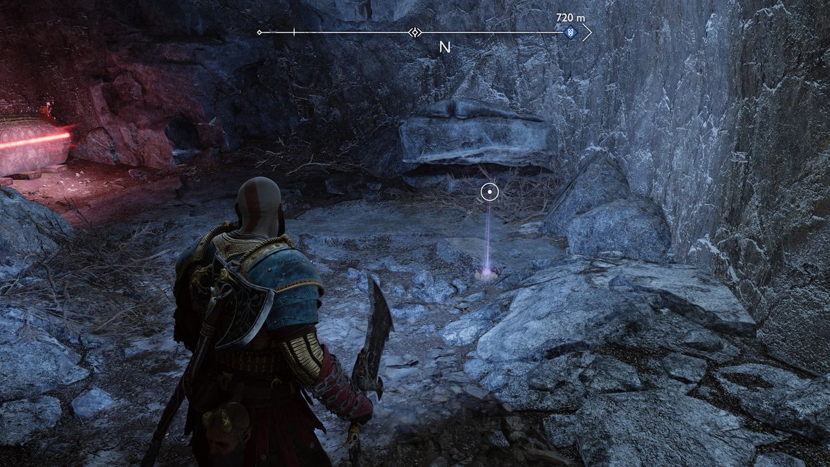 Kratos grabs an Artifact off the ground in God of War Ragnarok
