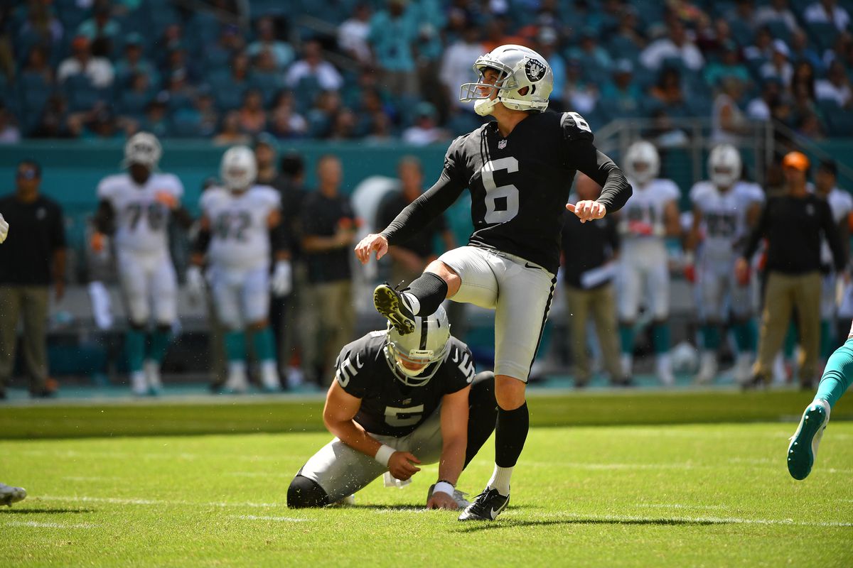 Mike Nugent of the Oakland Raiders kicks a field goal against the Miami Dolphins at Hard Rock Stadium on September 23, 2018 in Miami, Florida.