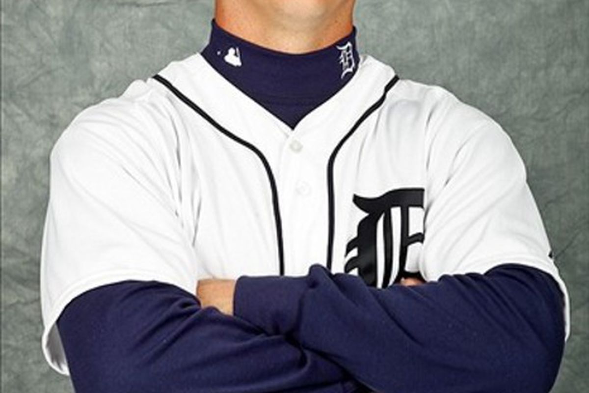 February 28, 2012; Lakeland, FL, USA; Detroit Tigers left fielder Andy Dirks (12) poses for photo day in the rec room at the Detroit Tigers headquarters.  Mandatory Credit: Derick E. Hingle-US PRESSWIRE