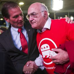 Rep. Chris Stewart, R-Utah, shakes hands with George Zinn during the Utah GOP election night party at Rice-Eccles Stadium in Salt Lake City on Tuesday, Nov. 8, 2016.