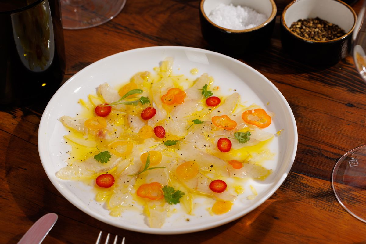 Fluke crudo dressed with peppers. 