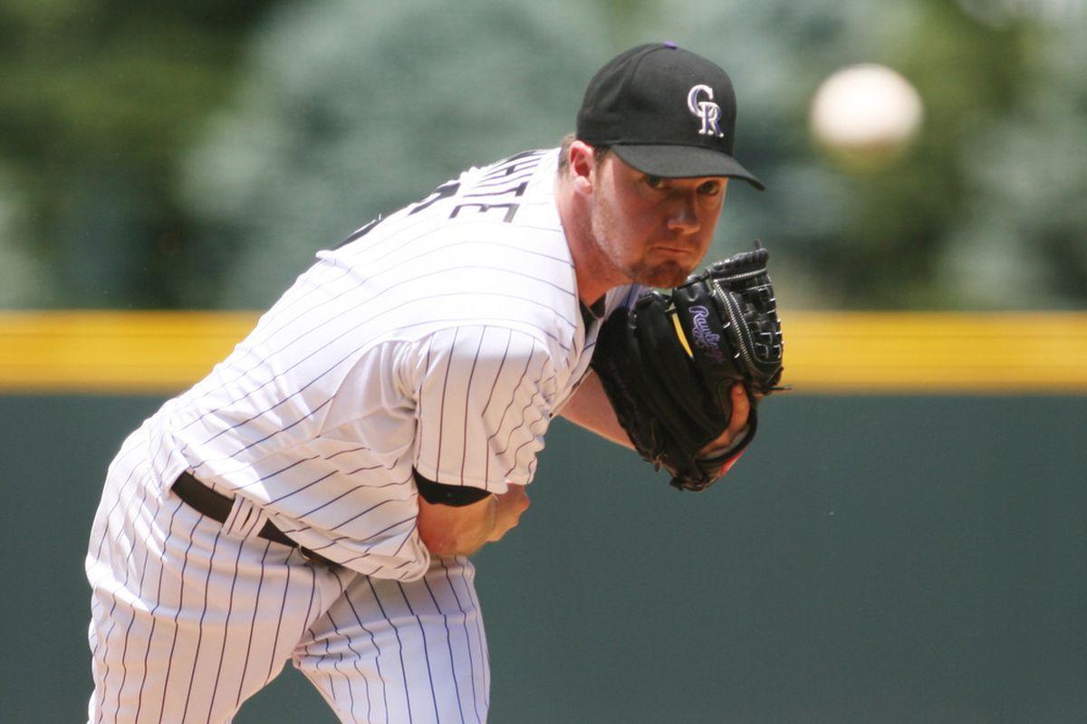June 3, 2012; Denver, CO, USA; Colorado Rockies pitcher Alex White (6) delivers a pitch during the first inning against the Los Angeles Dodgers at Coors Field.  Mandatory Credit: Chris Humphreys-US PRESSWIRE