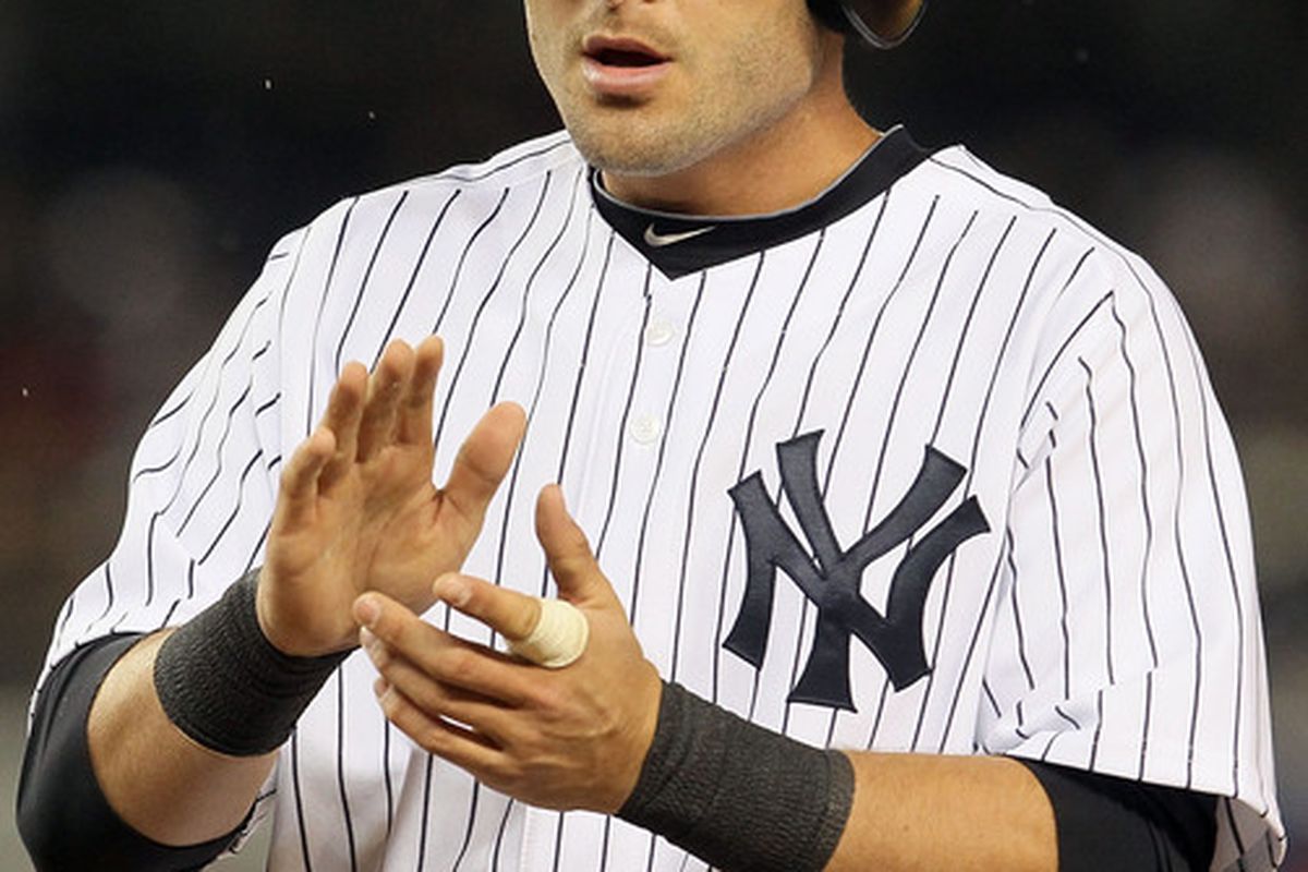 NEW YORK - APRIL 16:  Francisco Cervelli #29 of the New York Yankees celebrates his fourth inning RBI single against the Texas Rangers on April 16, 2010 at Yankee Stadium in the Bronx borough of New York City.  (Photo by Jim McIsaac/Getty Images)