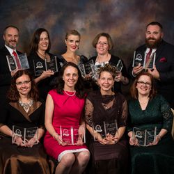 The 2017 Whitney Awards winners are, back row from left: Dan Wells, author of "Ones and Zeroes" in the young adult speculative fiction category; Heather B. Moore, author of "Condemn Me Not" in the historical category,  Emily R. King, author of “The Hundreth Queen” for youth novel of the year and best novel by a debut author; Traci Hunter Abramson, author of “Safe House”for best novel of the year from the adult fiction categories; and Tyson Abaroa, author of "The Fattest Mormon" in the general fiction category. 
Front row, from left: Rosalyn Eves, author of "Blood Rose Rebellion," winner in the young adult fantasy category; Elaine Vickers, author of "Paper Chains" in the middle grade fiction cateJulie Wright, author of "Lies Jane Austen Told to Me" in the romance category and Sarah M. Eden, author of "Love Remains" in the historical romance category. 
Not pictured at Charlie Holmberg, author of "The Fifth Doll" in the speculative fiction category; and Kasie West, author of "By Your Side" in the young adult general fiction category.