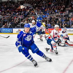 Syracuse Crunch Ross Colton (22) celebrates his goal against the Springfield Thunderbirds in American Hockey League (AHL) action at the War Memorial Arena in Syracuse, New York on Saturday, December 29, 2018. Syracuse won 4-3 in OT.