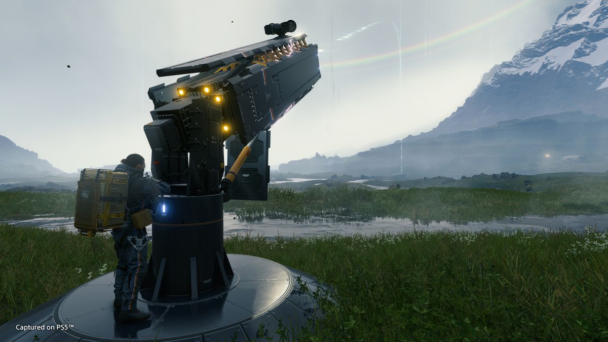 Sam Porter bridges aims a cargo cannon, one of the new additions in Death Stranding: Director’s Cut.