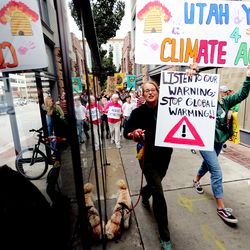 Hundreds of climate activists seeking action from local and state leaders to combat climate change march to the Capitol in Salt Lake City for a rally on Friday, Sept. 20, 2019.