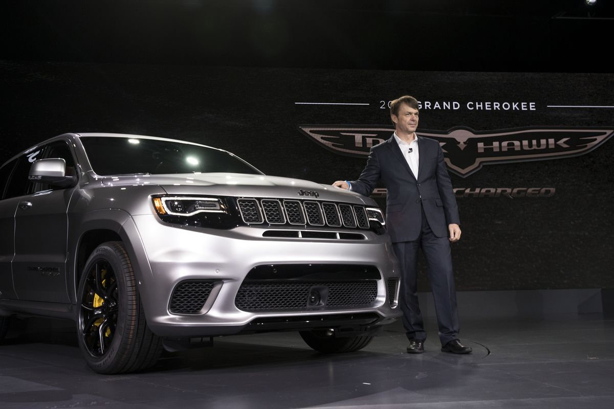Mike Manley, president and CEO of Jeep, stands next to a new 2018 Jeep Grand Cherokee Trackhawk at the New York International Auto Show in April 2017.
