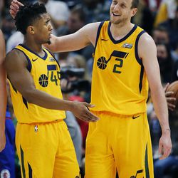 Utah Jazz forward Joe Ingles (2) greets Utah Jazz guard Donovan Mitchell after Mitchell hit a basket and was fouled during NBA basketball against the Los Angeles Clippers in Salt Lake City on Saturday, Jan. 20, 2018.
