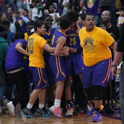 Waukegan’s team celebrates after winning over Fremd, Wednesday 03-06-19. Worsom Robinson/For the Sun-Times.