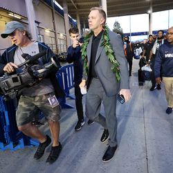 Virginia Cavaliers head coach Bronco Mendenhall walks to the locker room as he and his team arrive at the stadium as BYU and Virginia prepare to play at LaVell Edwards Stadium in Provo on Saturday, Oct. 30, 2021.