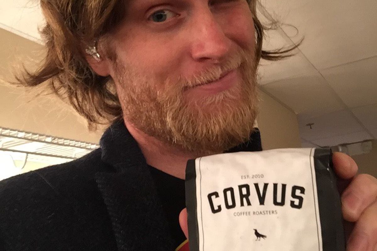 The Lumineers lead vocalist Wes Schultz holds a bag of his band-brand Corvus coffee 
