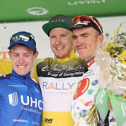 Top finishers Robert Britton, center Gamvin Mannion, left, and Serghei Tvetcov stand on the podium after Stage 7 of the Tour of Utah cycling race in Salt Lake City on Sunday, Aug. 6, 2017.