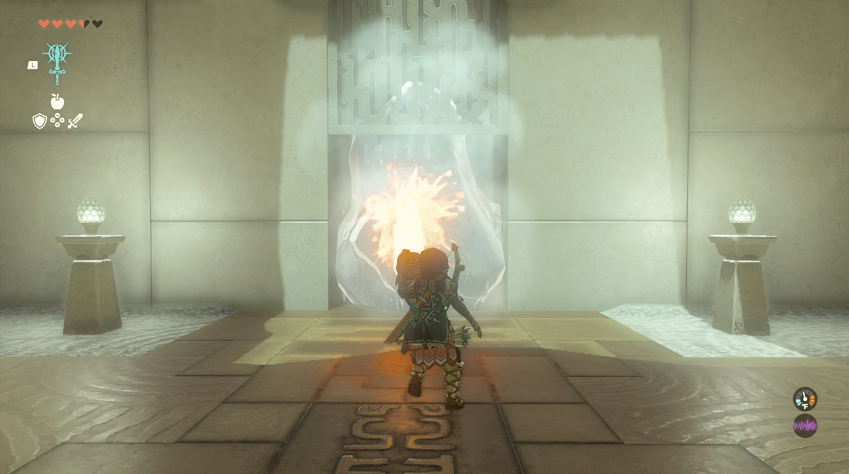 An image of Link melting ice in the Ijo-o shrine in The Legend of Zelda: Tears of the Kingdom with a flame emitter shield.