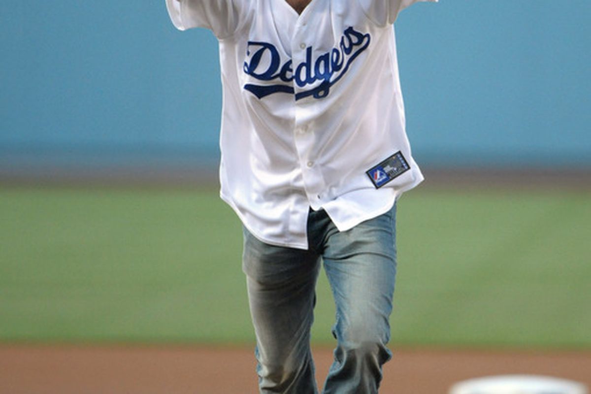 Singled Out began 16 years ago, and instead of Jenny McCarthy, the Dodgers picked this guy to throw out a pitch.  C'mon, Magic.